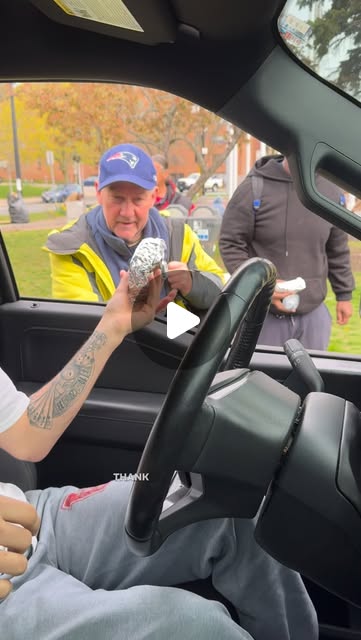 Video still from @zacksartori handing out food from a partner restaurant